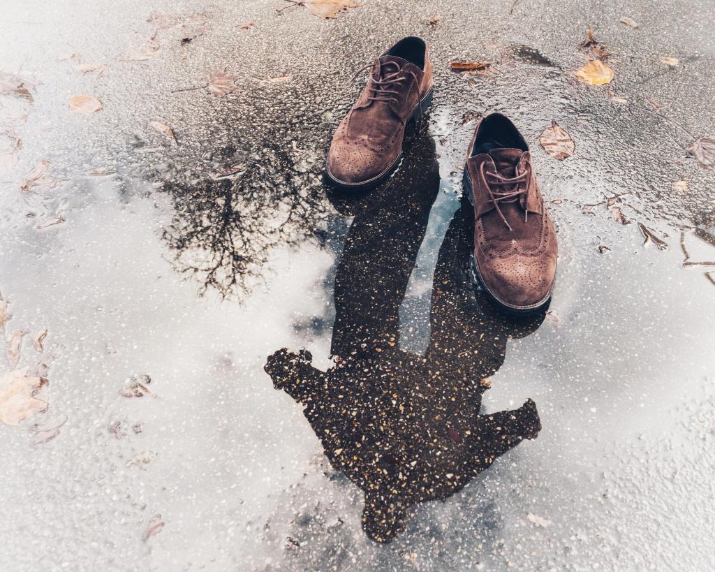 shoes with reflection of owner